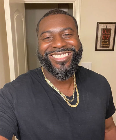 Man smiling with his beard