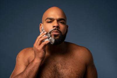 Men washing his beard with Scotch porter products