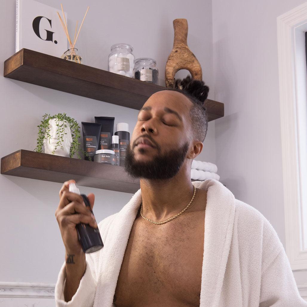 Beard and Hair Conditioner spray being used by model 